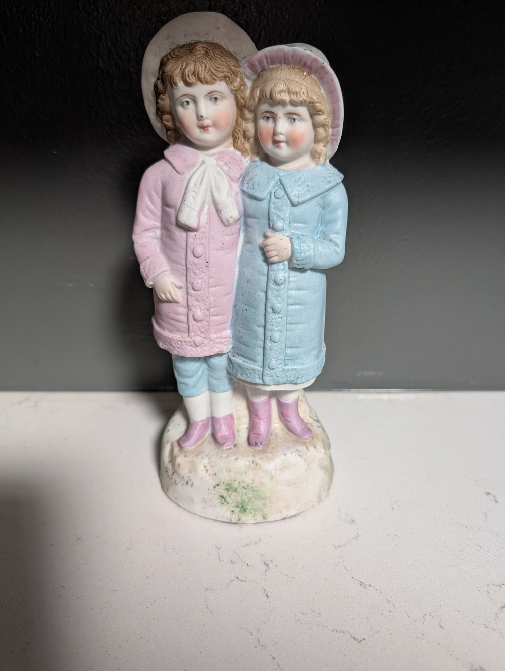 Vintage Porcelain Figurine of Boy & Girl in Pink and Blue Coats